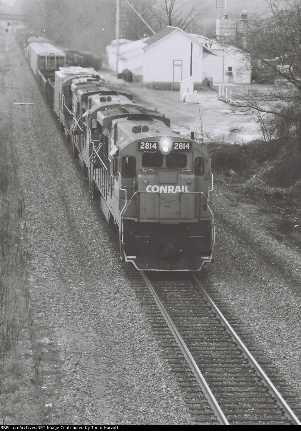 CR 2814 leads an eastbound freight in this undated scene